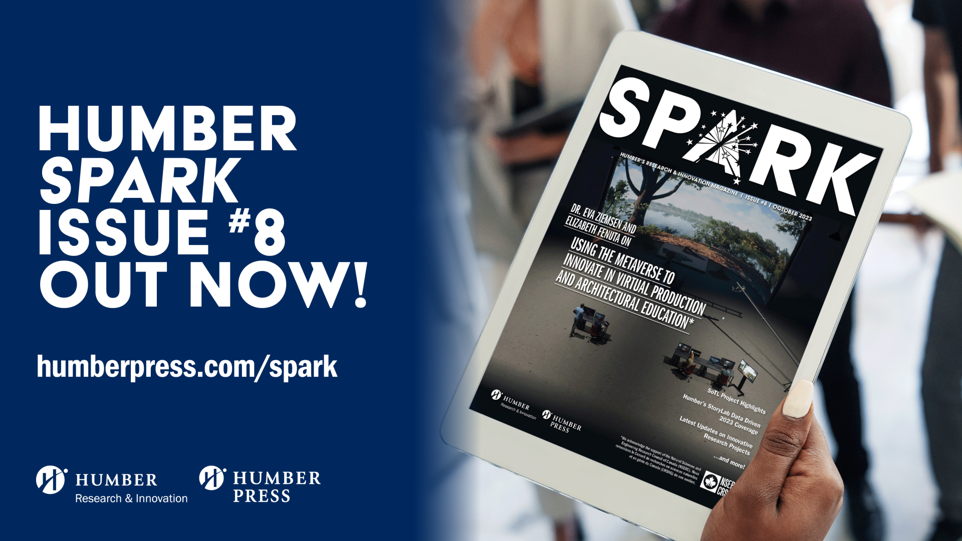 A hand holds a tablet displaying the cover of Spark Issue 8.