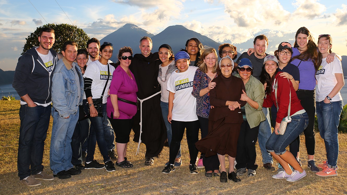 Group of smiling Humber students staff and community partners