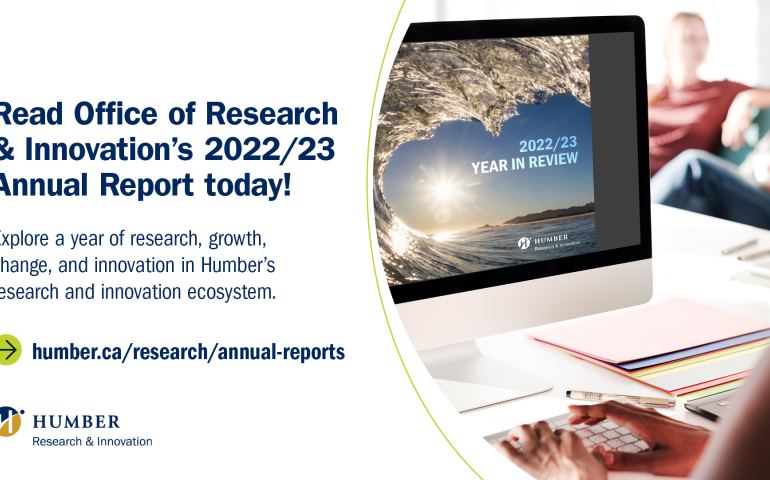 The cover of Annual Report 2022-2023 displayed on a MAC PC screen.